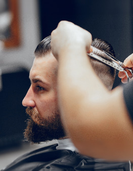 Barber cutting hair